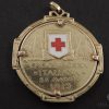 Rara medaglia, in oro giallo 22 carati (900) e smalti, coniata su iniziativa del Comitato di Propaganda della Croce Rossa di Milano 2