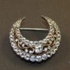 Spilla Napoleone III in oro, argento e strass e oro rosso Spilla Napoleone III in oro, argento e strass e oro rosso